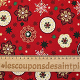 Popeline de coton imprimée médaillons et flocons de Noël fond rouge