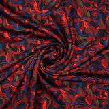 Crêpe satiné de polyester Amaryllis bordeaux et bleu marine fond noir