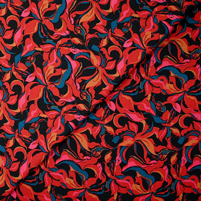 Crêpe satiné de polyester Amaryllis rouge et bleu canard fond noir