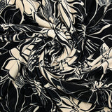 Jersey de velours ras imprimé fleurs ivoire fond noir