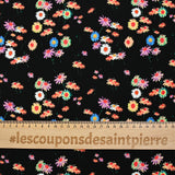 Jersey de viscose imprimé fleur psychédélique fond noir