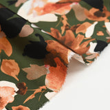 Satin polyester imprimé rose aquarelle orange fond kaki