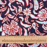 Jacquard de viscose satinée imprimée fleurs rouge et bleu ciel fond bleu