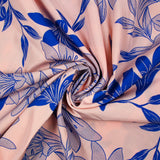 Polyviscose imprimée fleurs bicolore bleu roi fond rose pastel