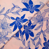 Polyviscose imprimée fleurs bicolore bleu roi fond rose pastel