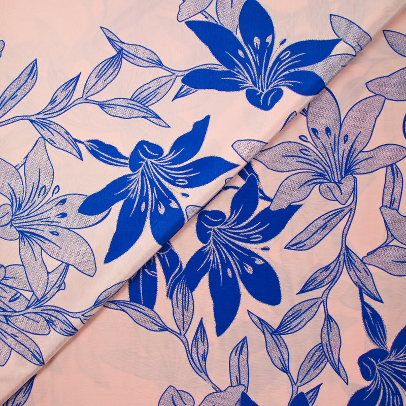 Polyviscose imprimée fleurs bicolore bleu roi fond rose pastel
