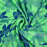 Satin polyviscose doupionné imprimé fleurs bicolore bleu fond vert