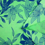 Satin polyviscose doupionné imprimé fleurs bicolore bleu fond vert