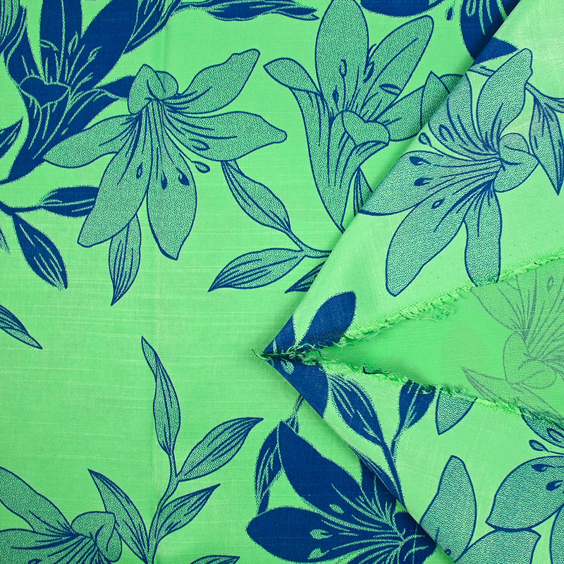 Satin polyviscose doupionné imprimé fleurs bicolore bleu fond vert
