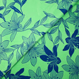 Satin polyviscose doupionné imprimé fleurs bicolore bleu fond vert