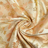Brocart lamé éclat de fleurs doré et rose blush