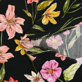 Viscose imprimée fleurs sauvages roses jaunes et orange fond noir