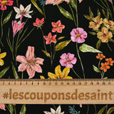 Viscose imprimée fleurs sauvages roses jaunes et orange fond noir
