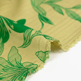 Polyviscose imprimée fleurs bicolore verte fond vert