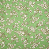 Viscosa estampada primavera blanco roto con fondo verde claro
