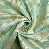 Brocart lamé éclat de fleurs doré et vert d'eau