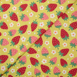 Cotton poplin printed with wild strawberries on anise background