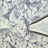 Viscose imprimée savane zèbre et girafe bleu marine fond blanc