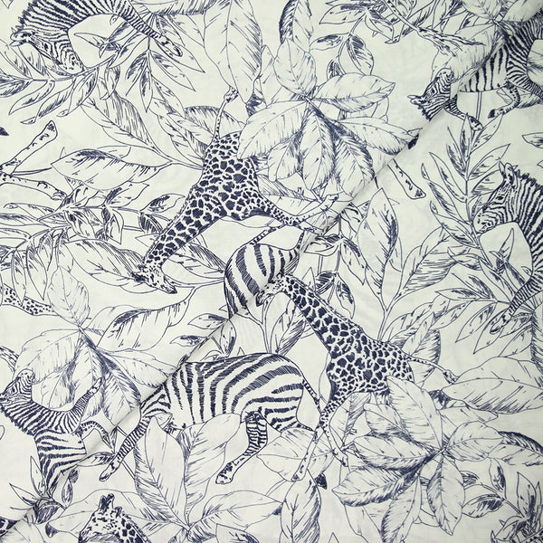 Viscose imprimée savane zèbre et girafe bleu marine fond blanc
