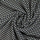 Viscose crepe with black graphic print on ecru background
