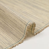 Mottled wool blend canvas with ecru background
