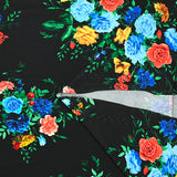Satin viscose knit bouquet of flowers black background