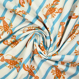 Coton imprimé homard et rayure bleue fond écru