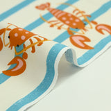 Coton imprimé homard et rayure bleue fond écru