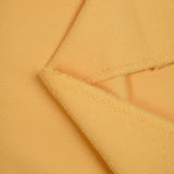 Sergé de laine mélangée bouclette jaune beurre