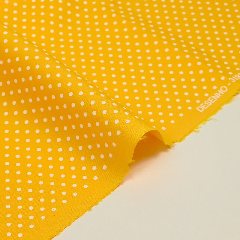 Coton imprimé pois 2mm fond jaune poussin