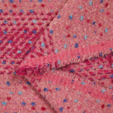 Wool blend tweed with raspberry check and pink confetti background