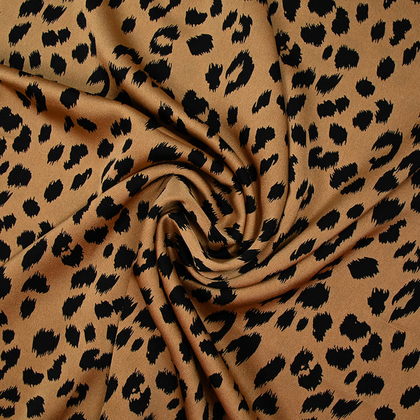 Crêpe satiné de polyester sauvage noire fond mordoré