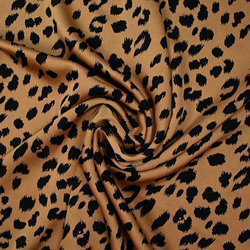 Crêpe satiné de polyester sauvage noire fond mordoré