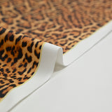 Tissu imperméable déperlant imprimé fourrure léopard fond jaune