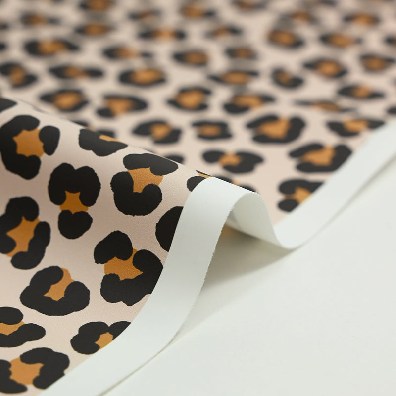 Tissu imperméable déperlant imprimé tacheté marron fond beige