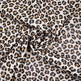 Tissu imperméable déperlant imprimé tacheté marron fond beige