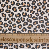 Tissu imperméable déperlant imprimé tacheté marron fond beige