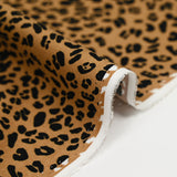 Viscose imprimée moucheté léopard noir fond alezan