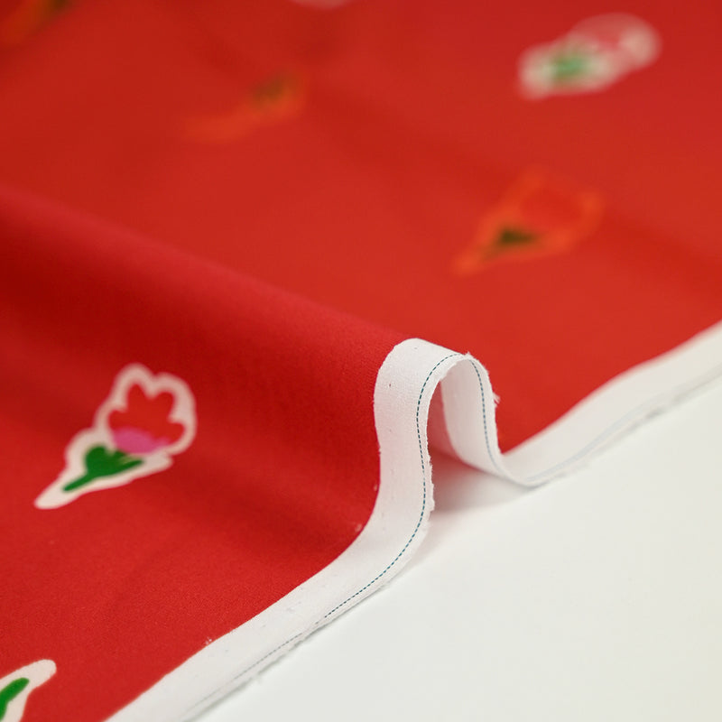 Coton imprimé petites fleurs fond rouge
