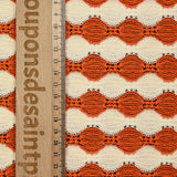 Maille polyester fantaisie écru et orange
