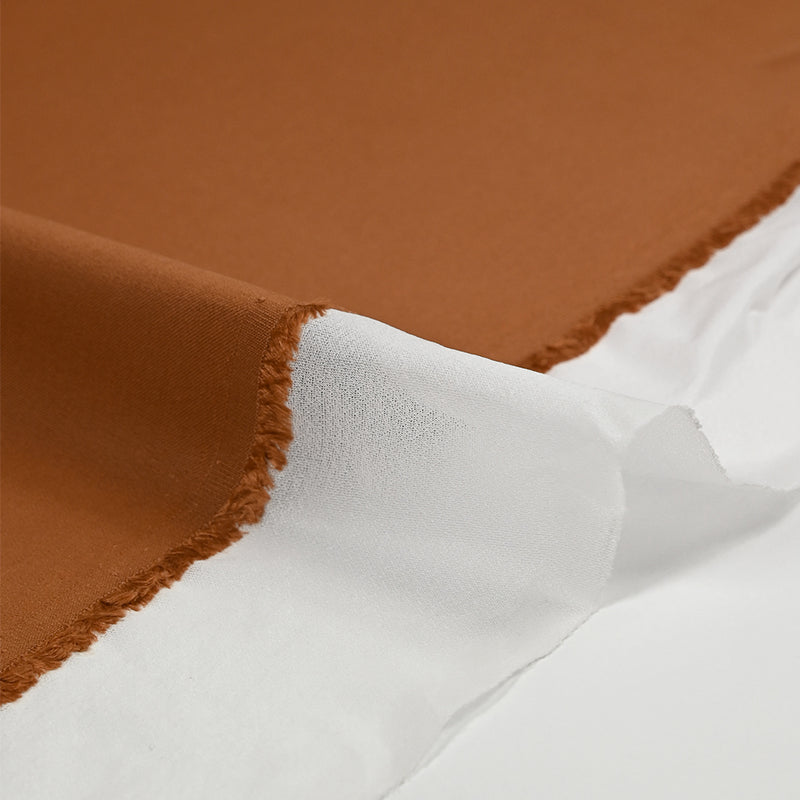 Sergé polycoton orange brûlé