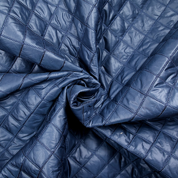 Matelassé polyester carreaux bleu marine