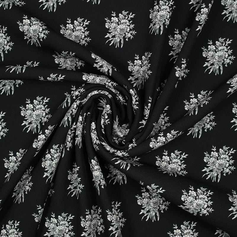 Crêpe printed gray flower medallion black background