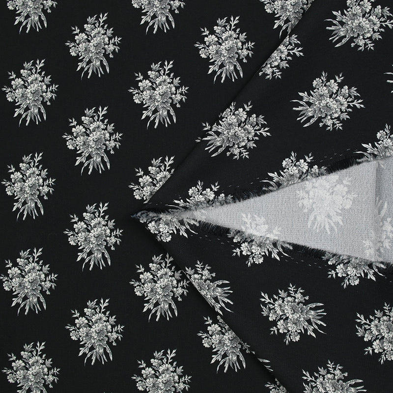 Crêpe printed gray flower medallion black background