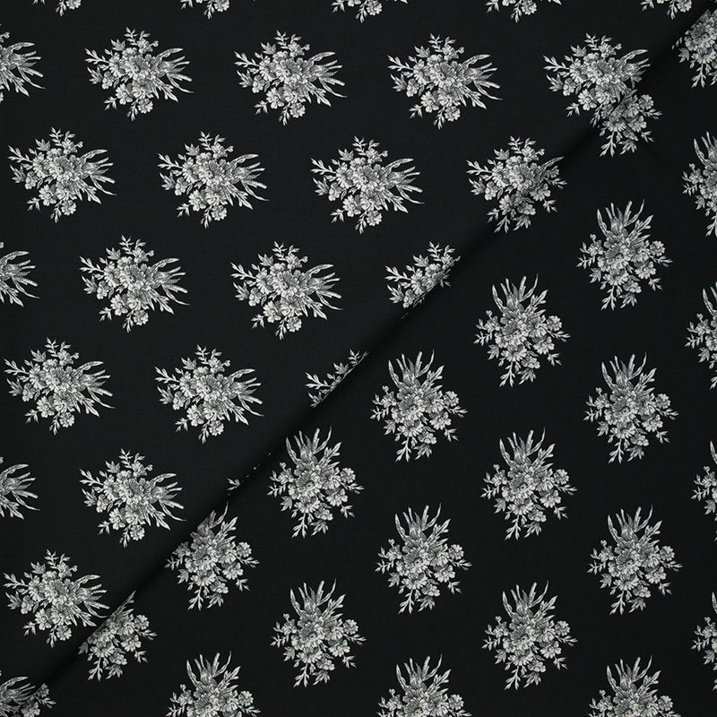 Crêpe printed gray flower medallion black background