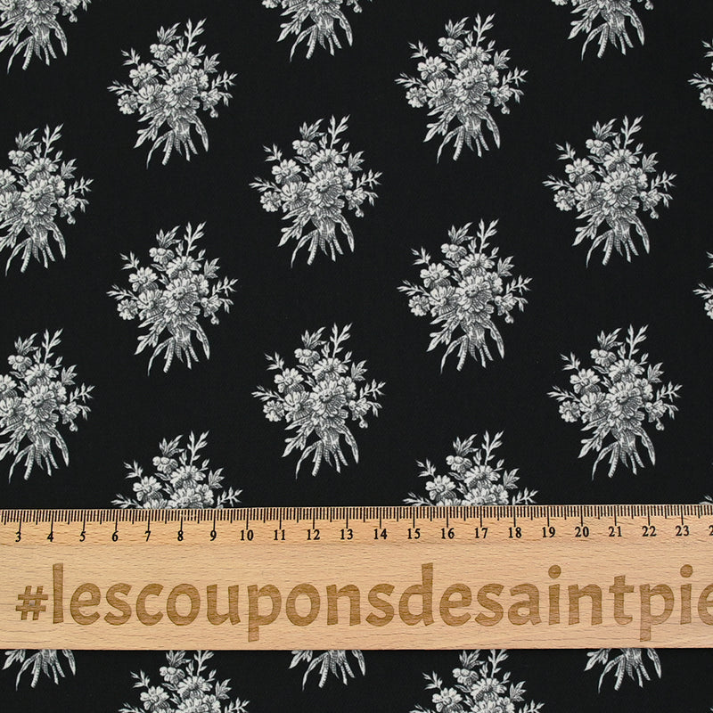 Crêpe printed gray flower medallion black background