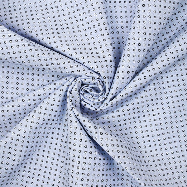 Coton tissé teint imprimé soleil noir fond bleu