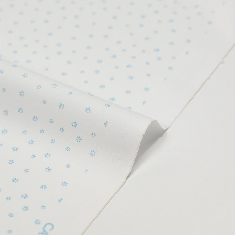 Coton chemise explosion mini fleur bleu ciel fond blanc