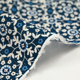Indian cotton printed white floral mosaic with denim blue background