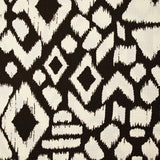 Maille de polyester imprimée ikat marron fond écru
